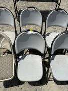 Eight Folding Chairs