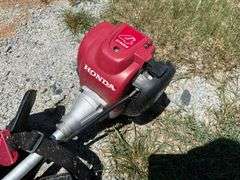 Honda 4-Stroke Gas-Powered String Trimmer with Shoulder Harness