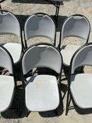 Eight Folding Chairs