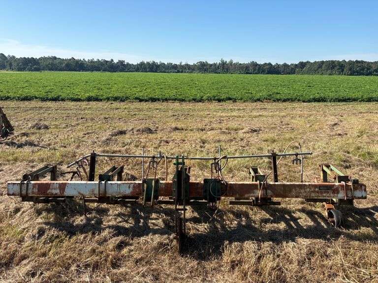 4 Row KMC Cultivator - Set up on 38" Rows (Does Not Include Tractor)