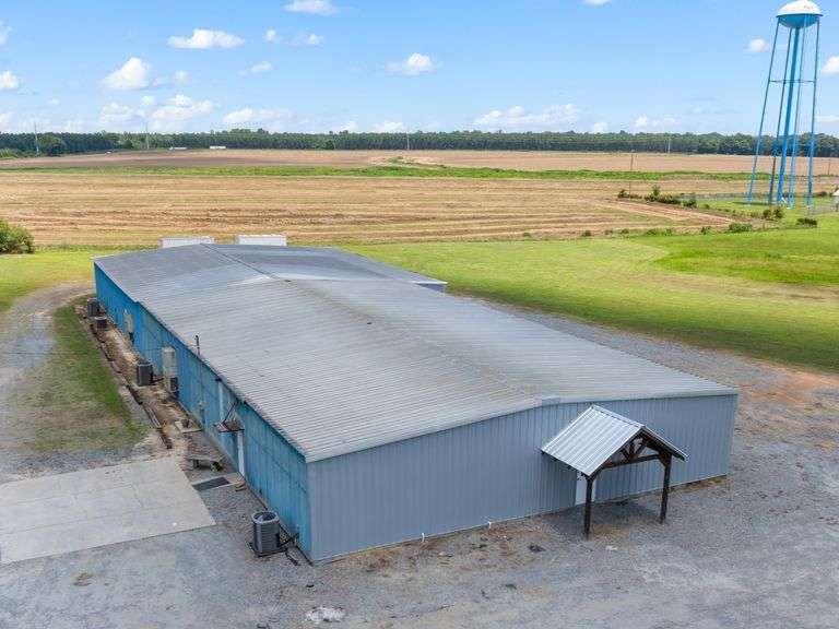 4.5 acres and 11,000 sq ft warehouse - HAS SEPTIC AND SURVEY