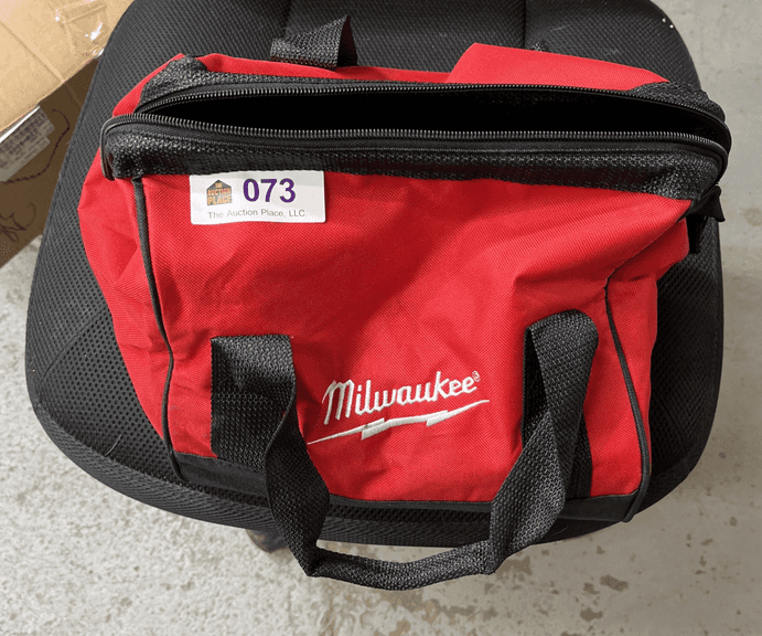 Milwaukee charger brushless drill and battery with bag new
