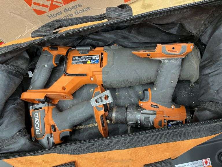 Rigid sawzall 2 drills and bag no batteries or charger used condition all work