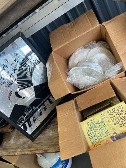Books, kitchenware and a picture