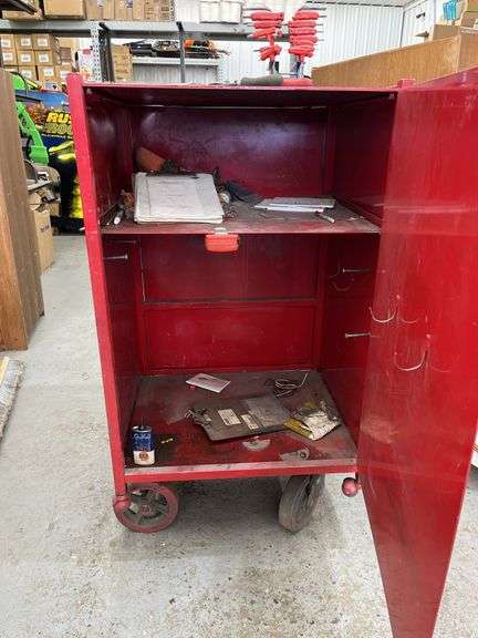 Large metal rolling cabinet with tools and miscellaneous