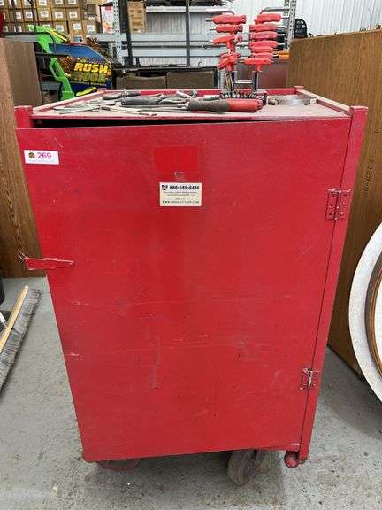 Large metal rolling cabinet with tools and miscellaneous