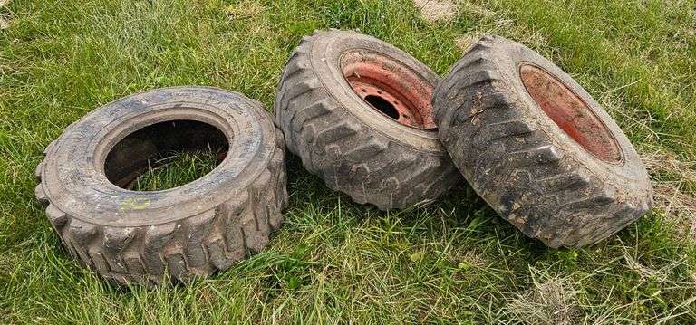 3 Bobcat skid-steer 12-16.5 tires (2 w/ rims)