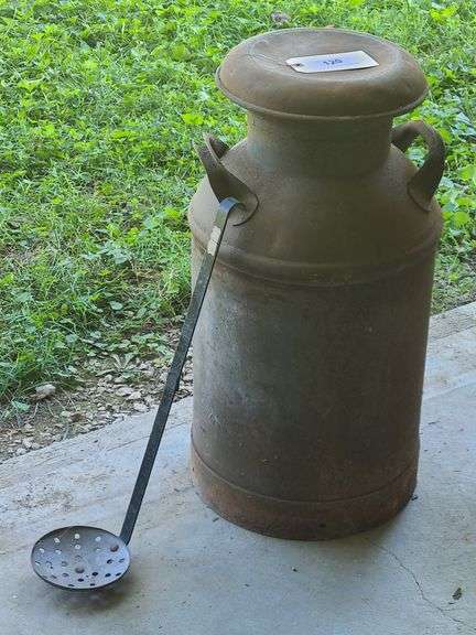 10-gallon milk can, and milk/cream dasher/agitator.