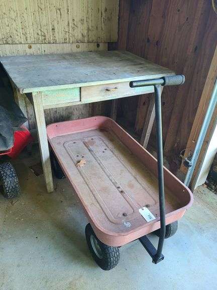 Metal yard wagon and vintage lead-covered table