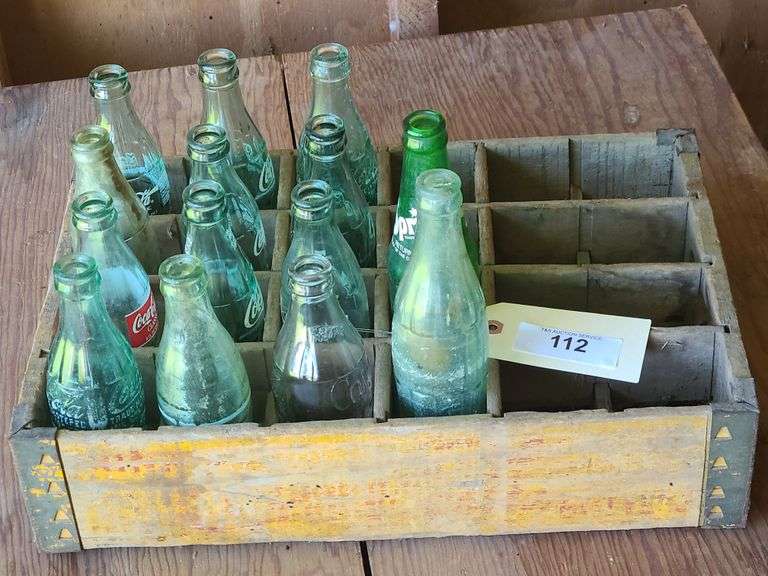 Vintage Coca-cola bottle box w/ several Coke bottles