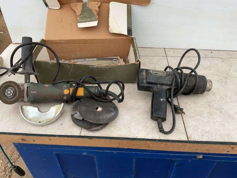 Working 4” Black Decker angle grinder, working heat gun