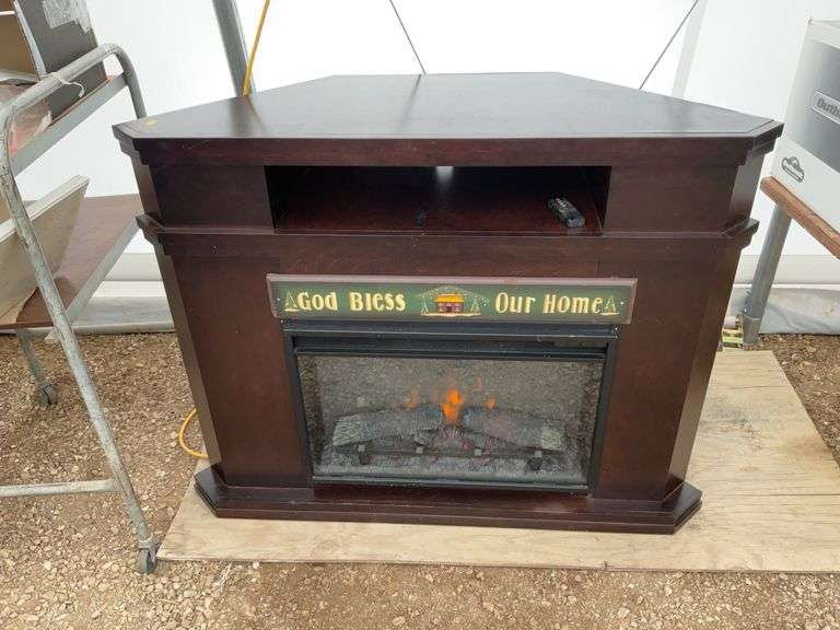 Nice working corner electric fireplace, measures 47"wide by 17"deep by 36 1/2" high