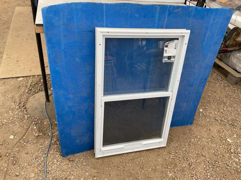 Unused Door window measures 22.5”x 36.5”. Comes with the screen and slides open