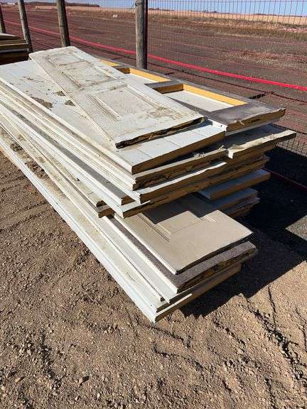 Large Qty of garage door panels various sizes & lengths (2 stacks)