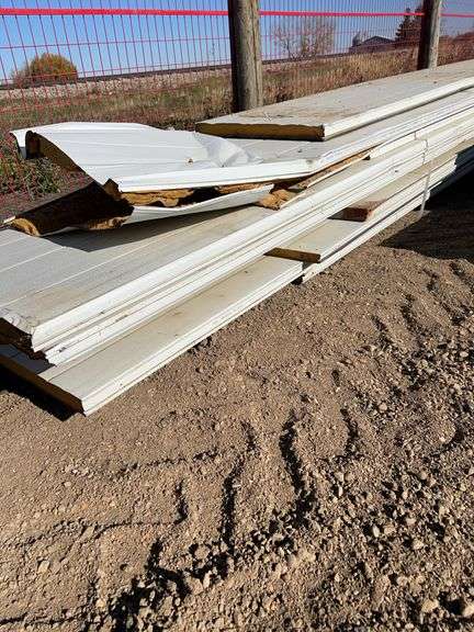 Qty of garage door panels various sizes & lengths (1 stack)