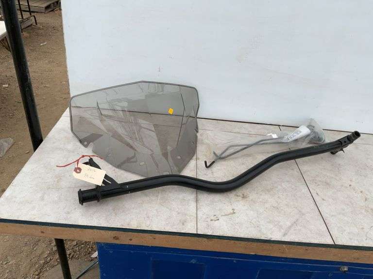 Steering post for a Skidoo XM and windshield for same, ice scratchers for all models