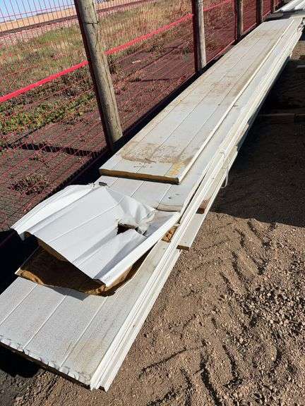 Qty of garage door panels various sizes & lengths (1 stack)