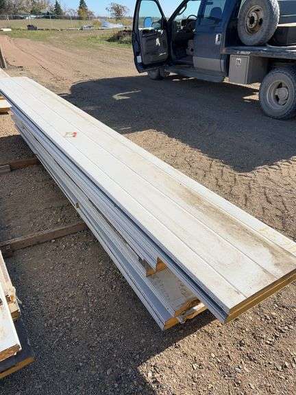 Qty of garage door panels various sizes & lengths (1 stack)