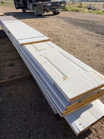 Qty of garage door panels various sizes & lengths (1 stack)