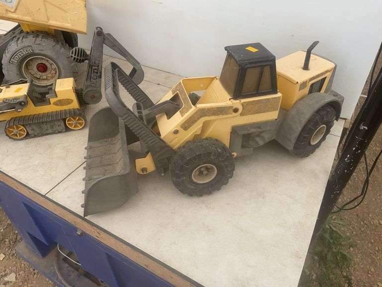 Three Tonka toys
