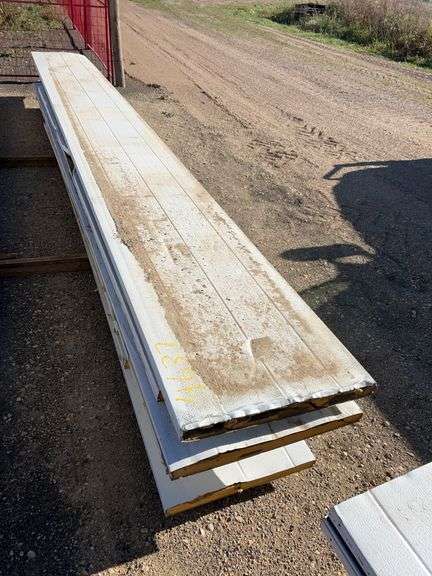 Qty of garage door panels various sizes & lengths (1 stack)