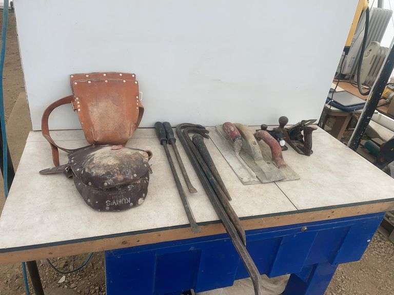 2 pair of Kunys kneeling pads, pair of goose necks, trowels, Stanley plane, shoulder strap