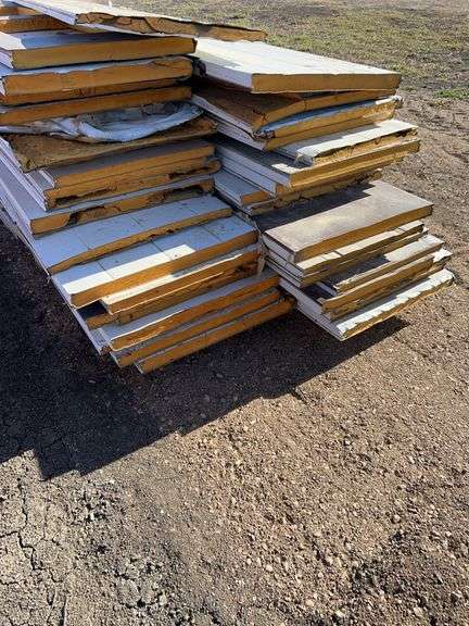 Large Qty of garage door panels various sizes & lengths (2 stacks)
