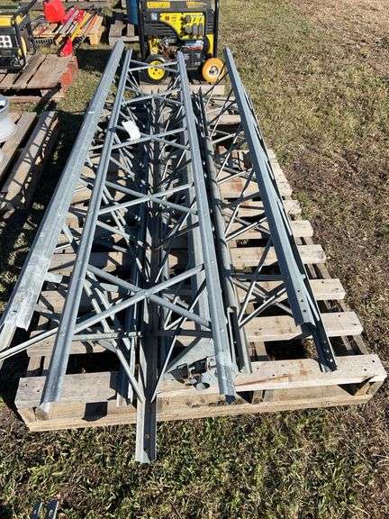 4 section antenna tower - each section 8’ c/w top pole and 3 concrete braces