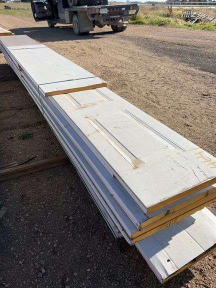 Qty of garage door panels various sizes & lengths (1 stack)