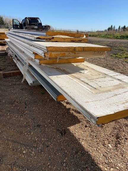 Qty of garage door panels various sizes & lengths (1 stack)