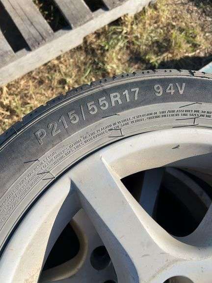 4 tires/rims Nissan P215/55R17