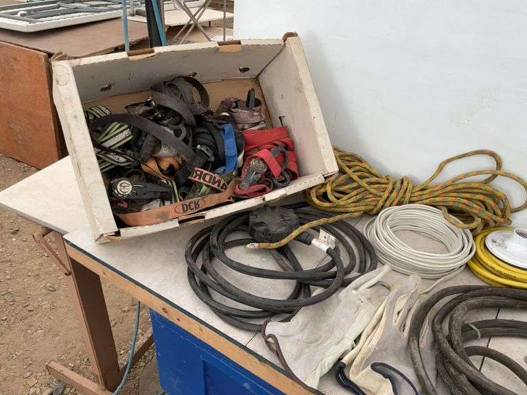 Pair of 14 foot heavy duty booster cables, quantity of new rope, miscellaneous ratchet straps, elect