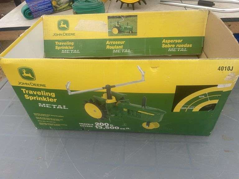 John Deere travelling sprinkler unused, pair of soaker hoses