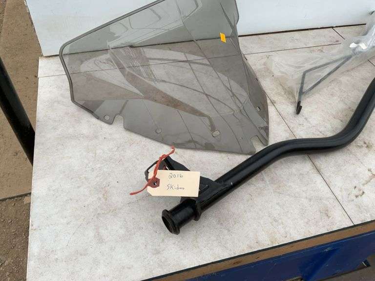 Steering post for a Skidoo XM and windshield for same, ice scratchers for all models