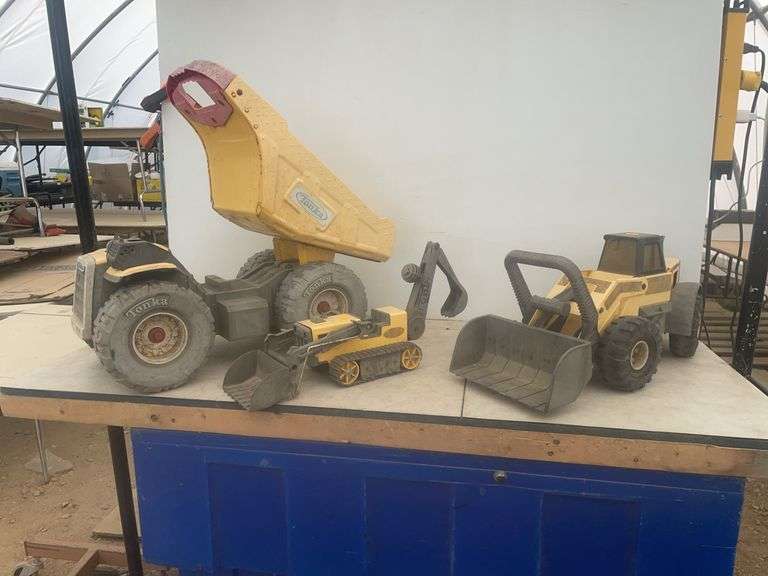 Three Tonka toys