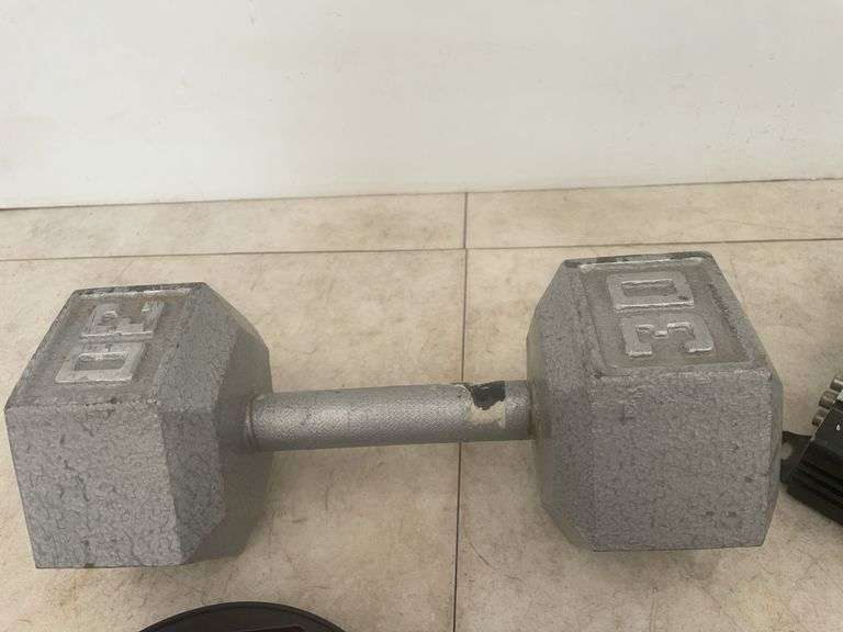 30 pound weight, a base amplifier - condition unknown, and a small set of screwdrivers