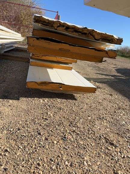 Qty of garage door panels various sizes & lengths (1 stack)