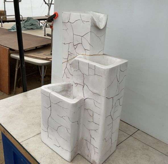 Unused outdoor crackle pillar fountain, comes with the pumps approximately 24" high