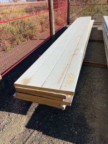 Qty of garage door panels various sizes & lengths (1 stack)