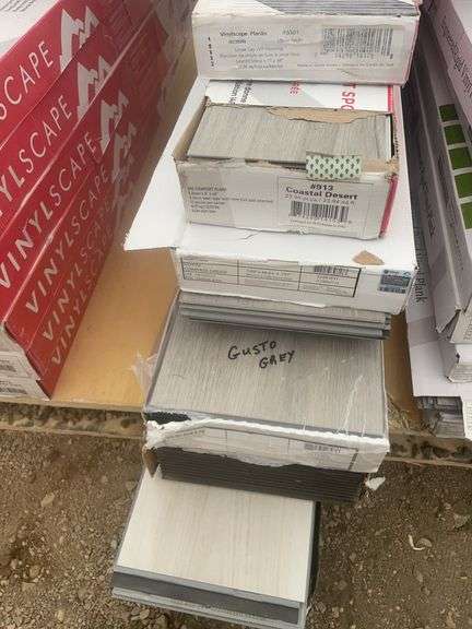 6 boxes of various flooring