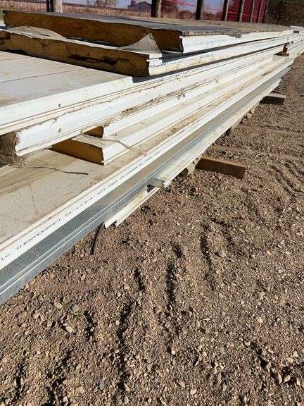 Qty of garage door panels various sizes & lengths (1 stack)