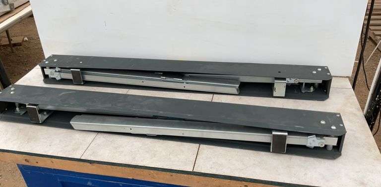 A pair of Heavy folding metal sawhorses hardly used