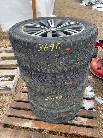 4 tires/rims off of a 2018 VW 245/50R18
