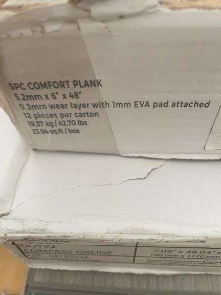 6 boxes of various flooring