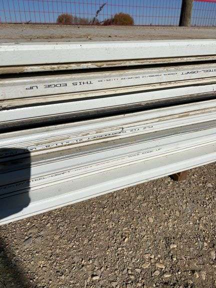 Qty of garage door panels various sizes & lengths (1 stack)