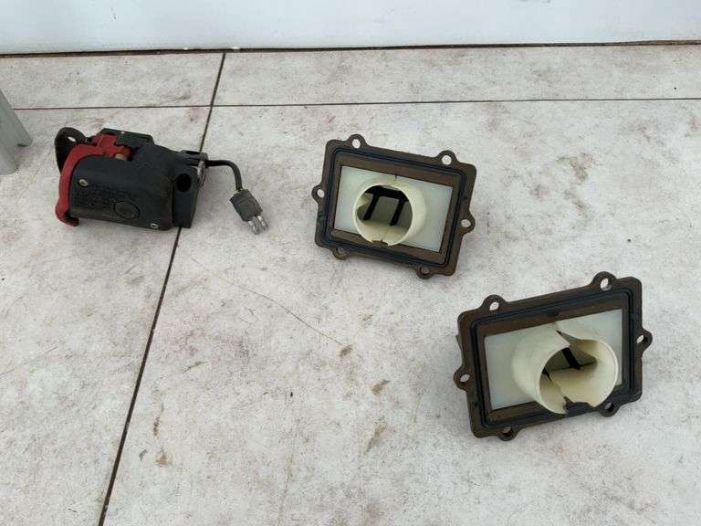 Pair universal bogey wheels, steering riser, reed valves for a Polaris snowmobile