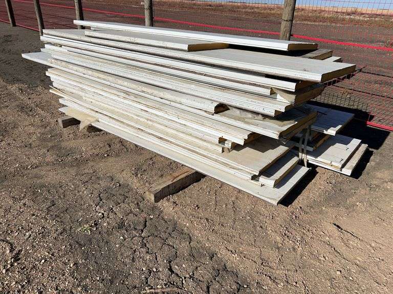 Large Qty of garage door panels various sizes & lengths (2 stacks)