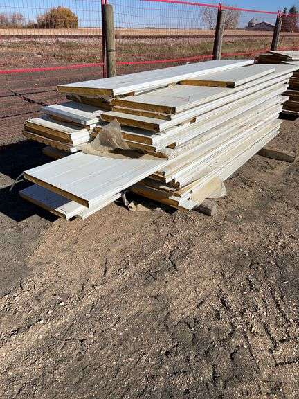 Large Qty of garage door panels various sizes & lengths (2 stacks)