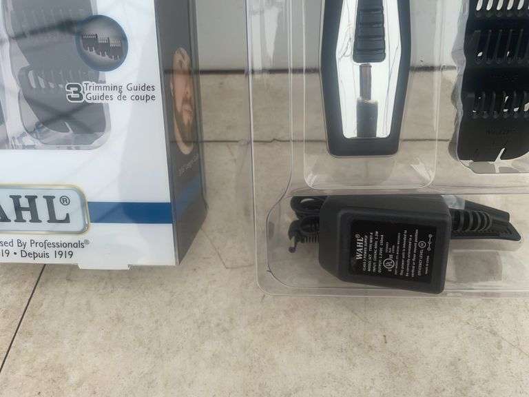 2 sets of unused WAHL beard trimmers, cordless comes with a charger