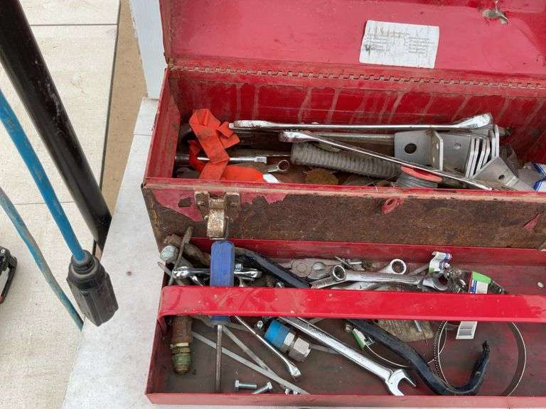 Toolbox comes with a quantity of miscellaneous tools including pipe wrench, crescent wrench, wheel w